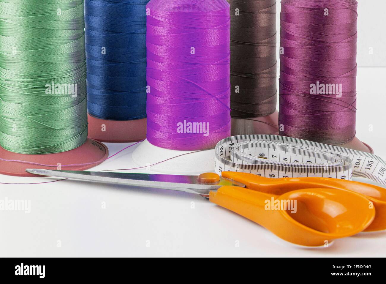 Sewing machine closeup measuring tape hi-res stock photography and ...