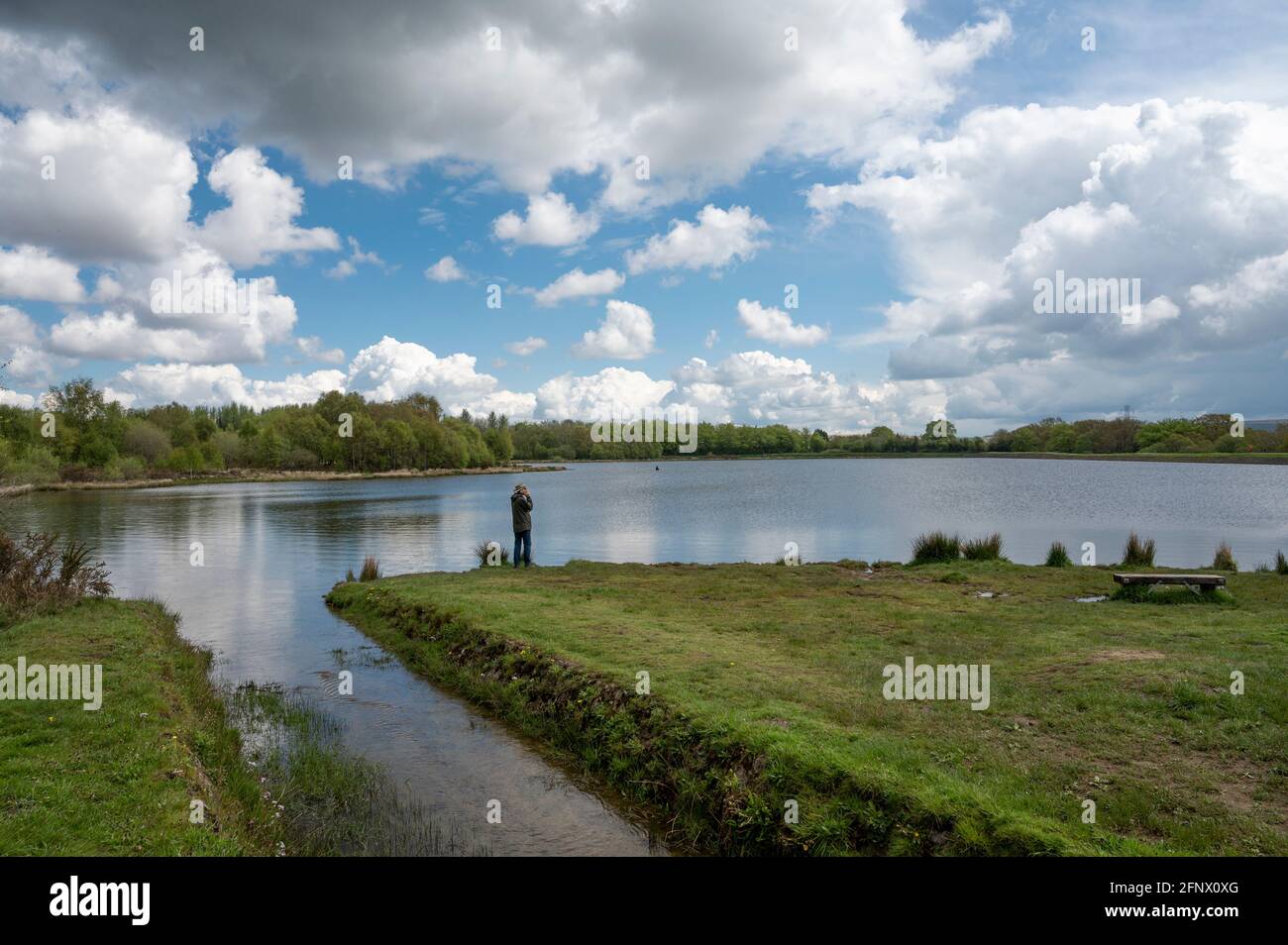 Rain clouds over Penyfan Pond, near Blackwood, South Wales Stock Photo