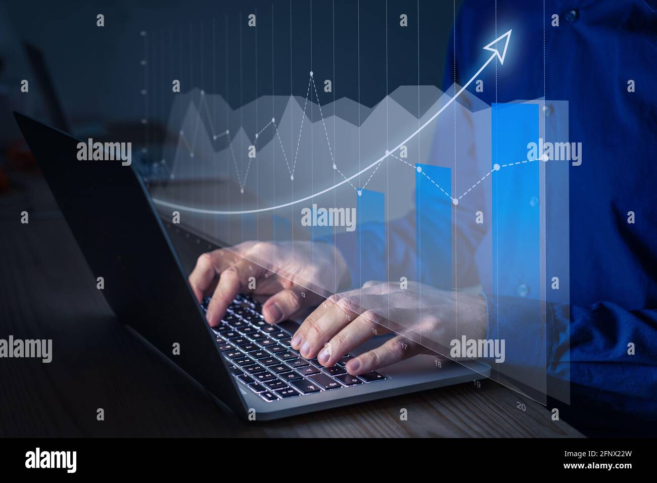 Financial charts showing growing revenue and successful investment strategies. Data analyst working on graph about finance and investing. Growing inco Stock Photo