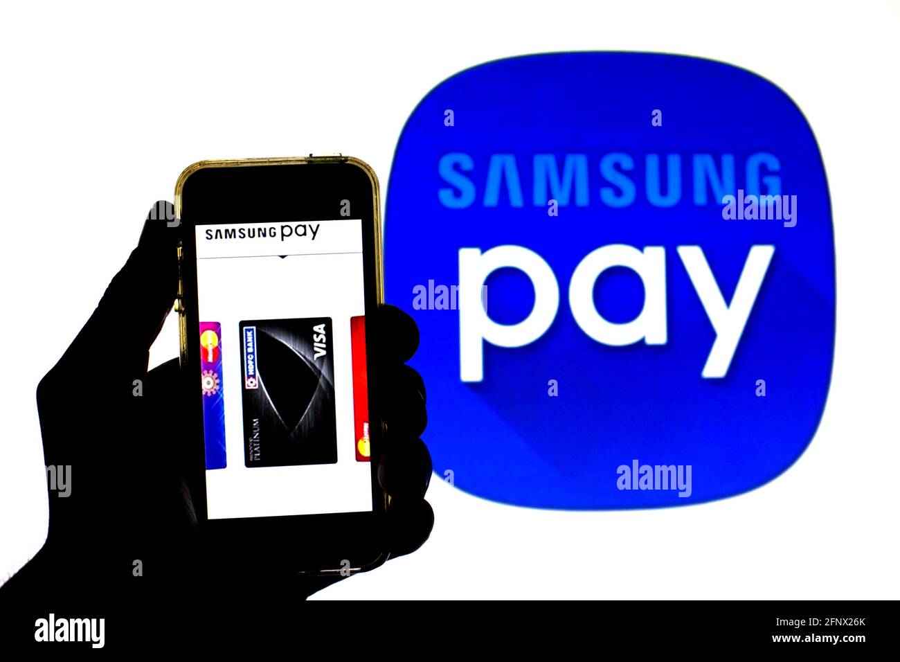 In This Photo Illustration A Samsung Pay App Seen Displayed On A Smartphone  With The Samsung Pay Logo In The Background Stock Photo - Alamy
