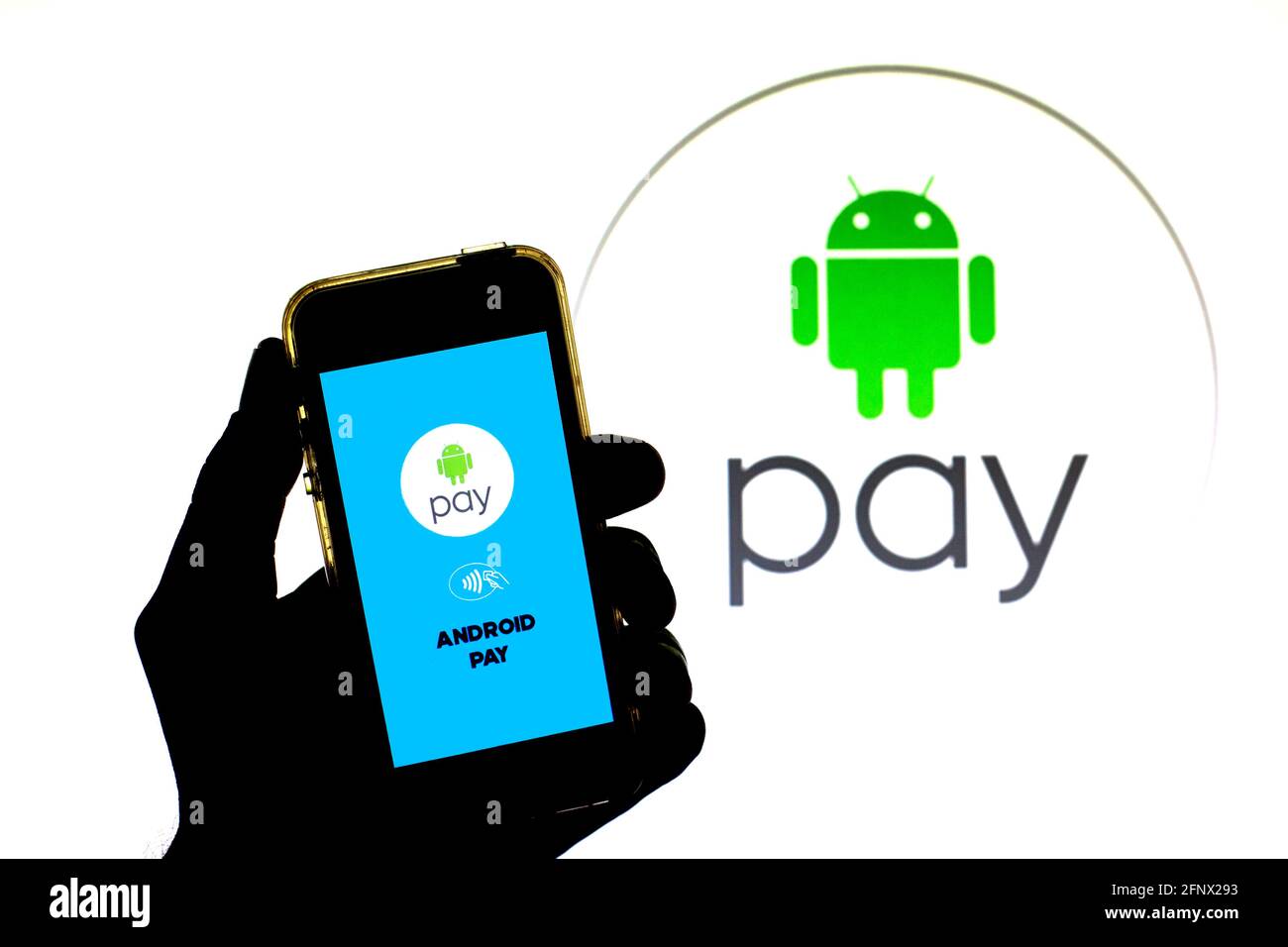 In this photo illustration an Android Pay seen displayed on a ...