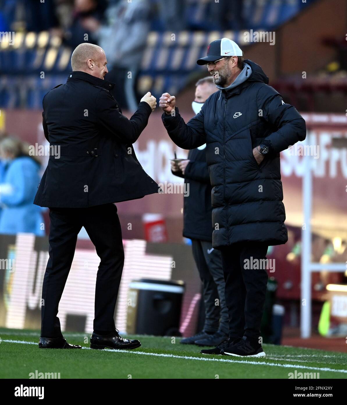 Liverpool manager Jurgen Klopp (right) and Burnley manager Sean Dyche ahead of the Premier League match at Turf Moor, Burnley. Picture date: Wednesday May 19, 2021. Stock Photo
