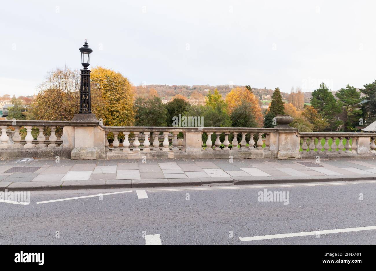 Grand Parade view with vintage street lamp and stone railings. Bath, Somerset. United Kingdom Stock Photo