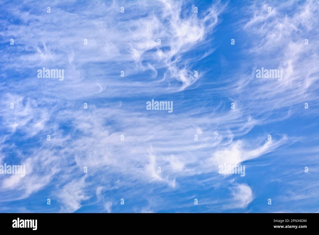 Cirrostratus clouds in the blue sky Stock Photo