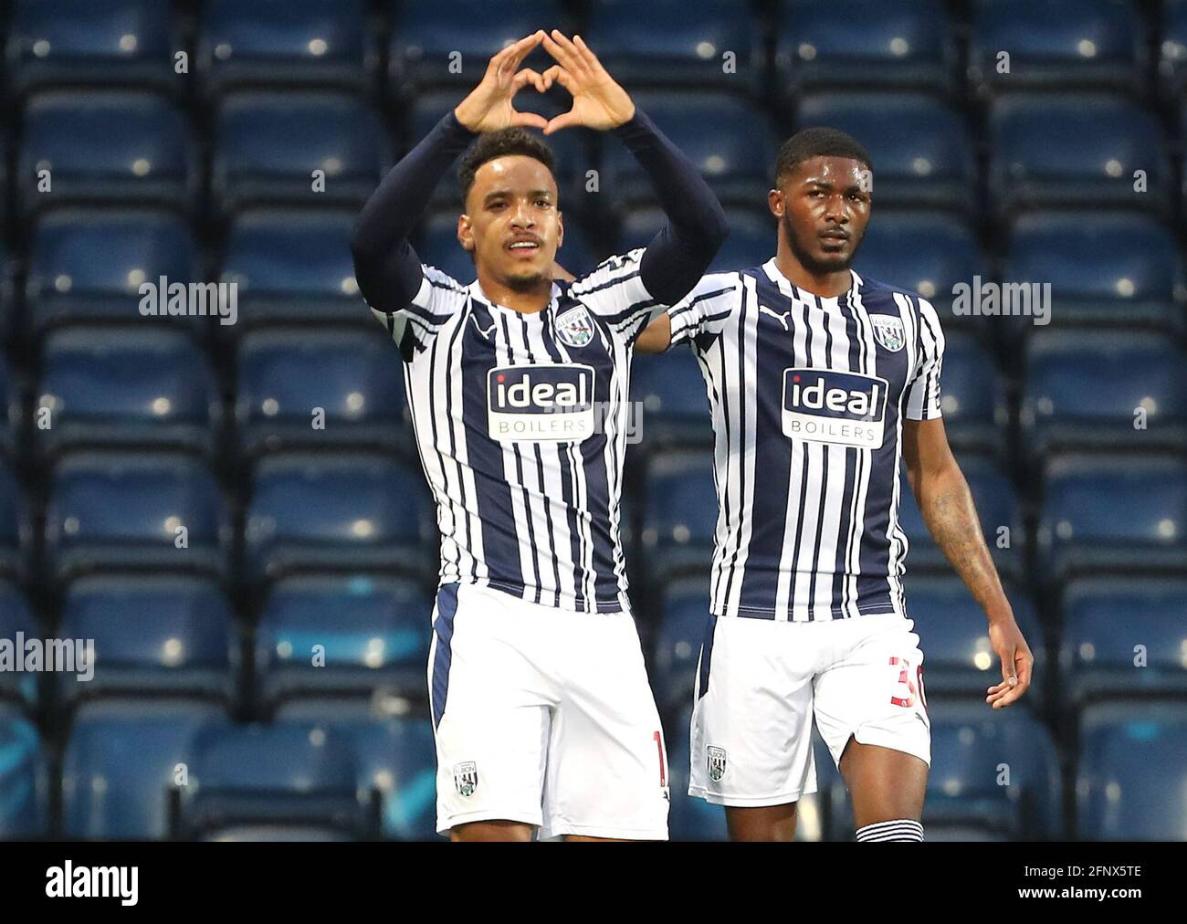 West Bromwich Albion's Matheus Pereira celebrates scoring their side's first goal of the game during the Premier League match at The Hawthorns, West Bromwich. Picture date: Wednesday May 19, 2021. Stock Photo