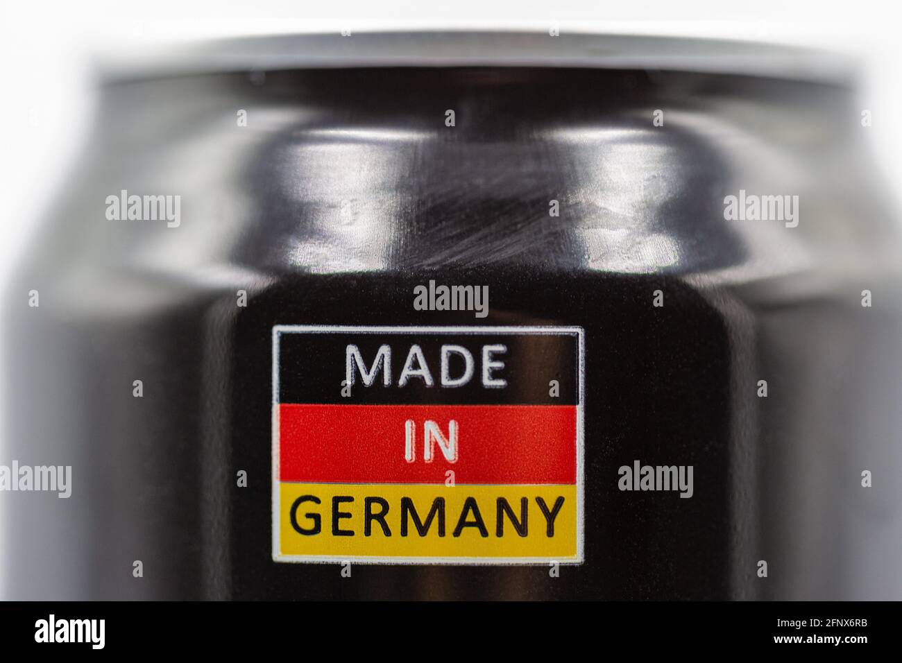 the inscription Made in Germany on the background of the colors of the German flag closeup on beer can Stock Photo