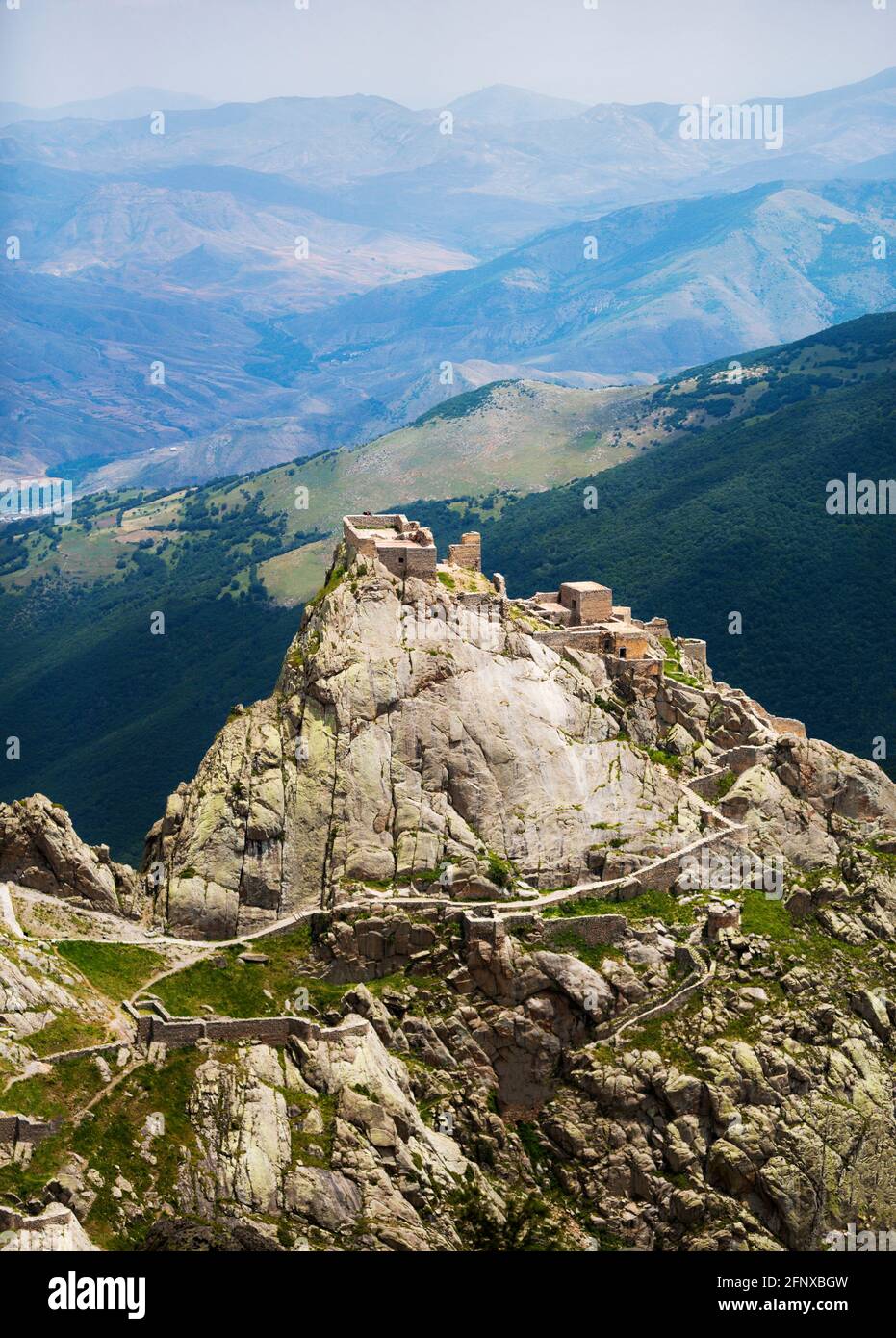 Babak Castle is an impressive and huge building citadel on the top of a mountain, which is located 15 km southwest of Kaleybar City in Iran. Stock Photo