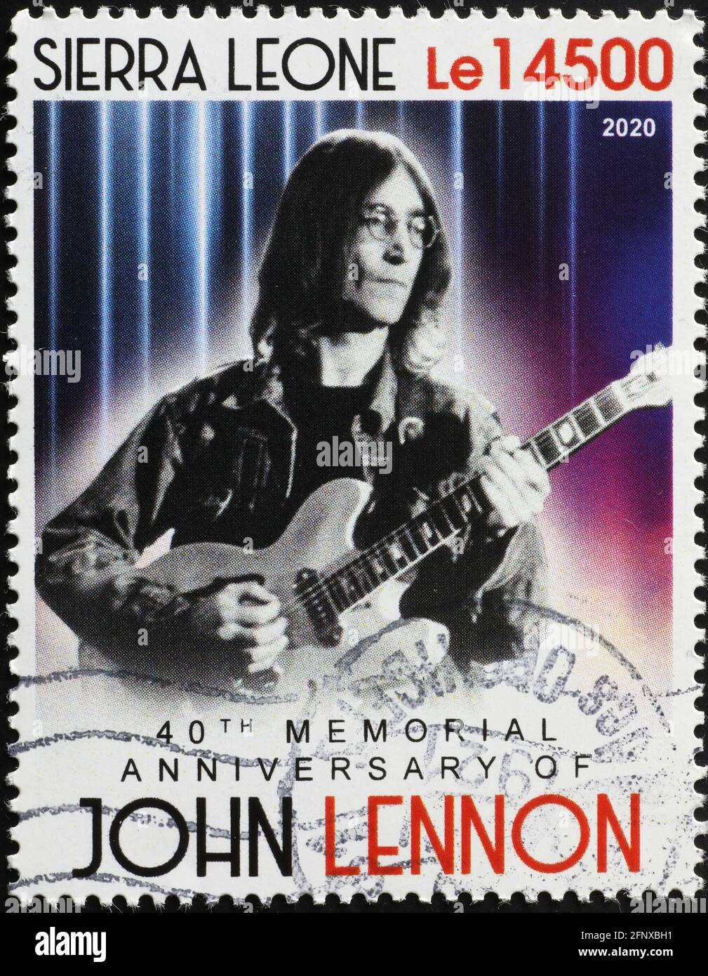 John Lennon Playing Guitar In Color