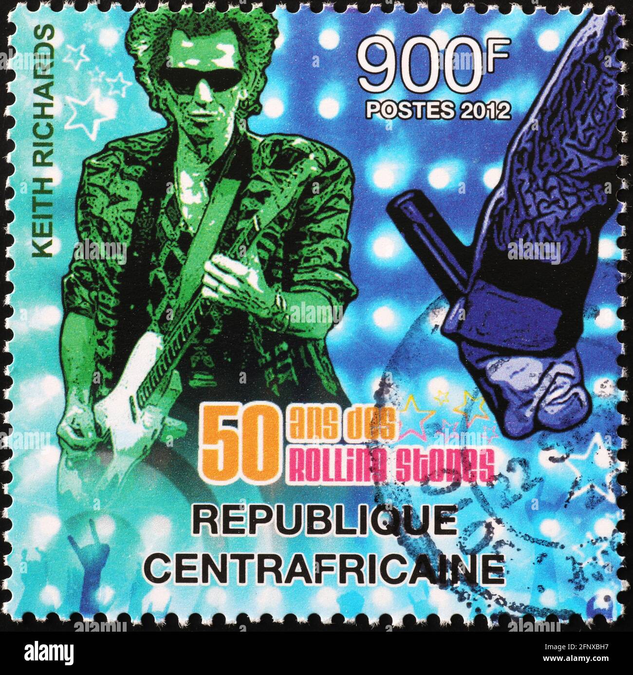 Keith Richards in concert on postage stamp Stock Photo