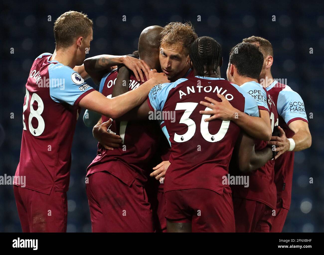 West Ham United's Angelo Ogbonna (centre) celebrates scoring their side's second goal of the game with team-mates during the Premier League match at The Hawthorns, West Bromwich. Picture date: Wednesday May 19, 2021. Stock Photo