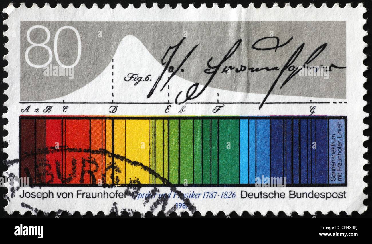 Light spectrum discovered by Joseph von Fraunhofer on stamp Stock Photo
