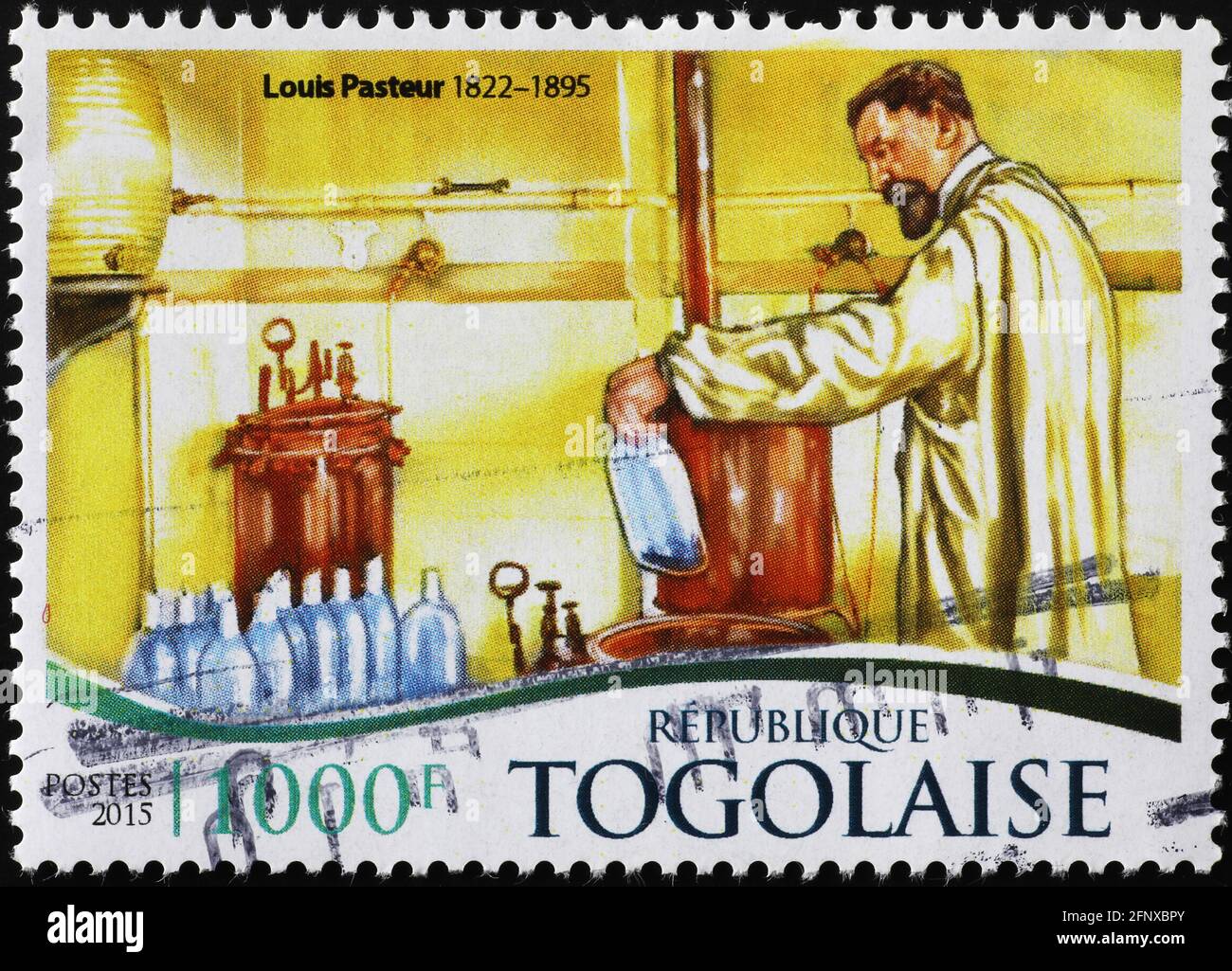 Louis Psteur at work on postage stamp Stock Photo