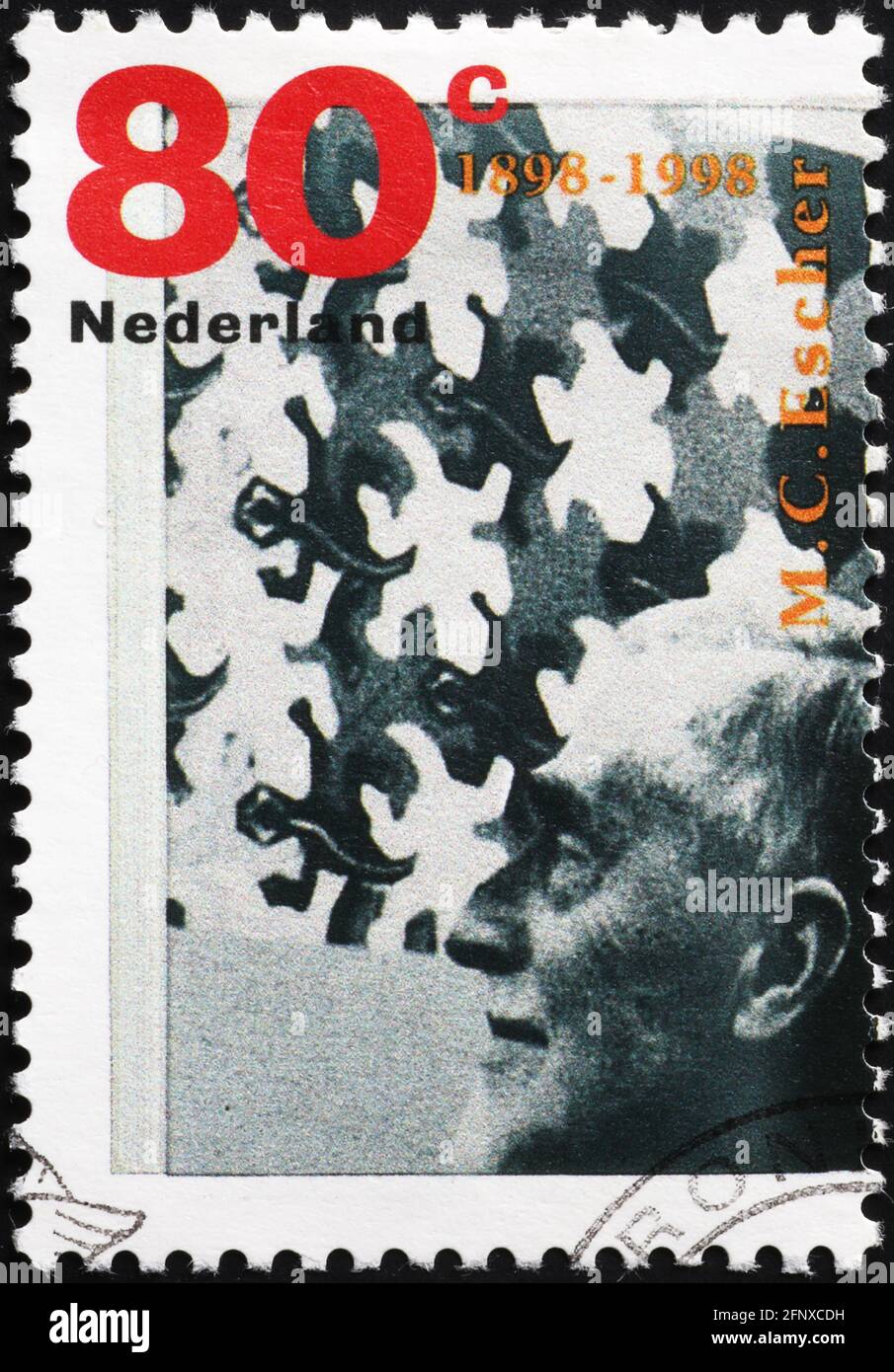 Portrait of Escher on dutch postage stamp Stock Photo