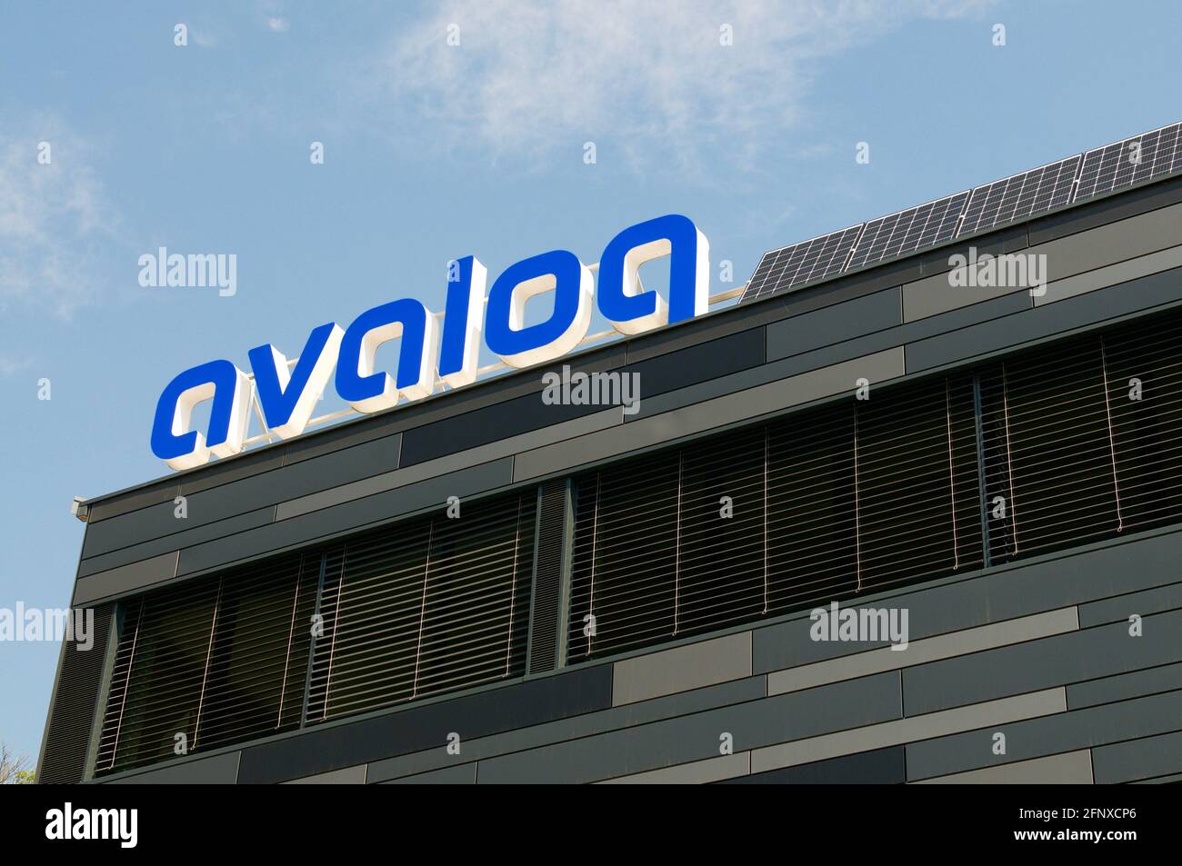 Bioggio, Ticino, Switzerland - 25th April 2021 : Avaloq company sign in front of the headquarters building in Bioggio. Avaloq is a Swiss company that Stock Photo