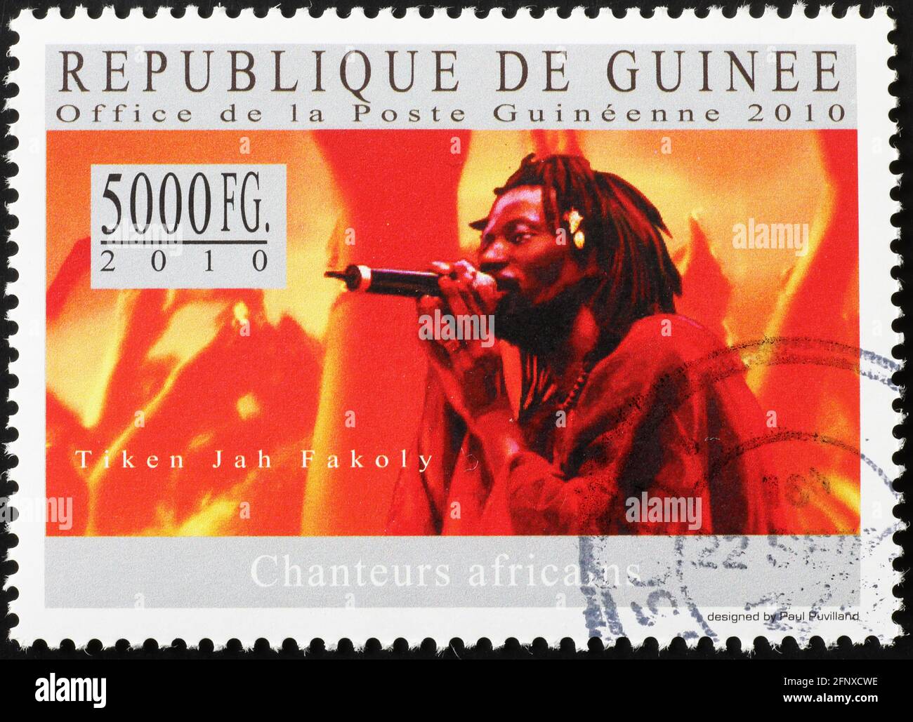 Tiken Jah Fakoly on postage stamp of Guinea Stock Photo