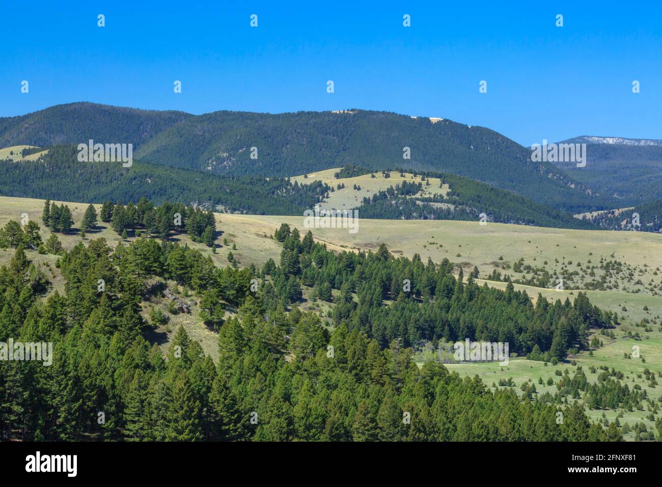 john long mountains above foothills near maxville, montana Stock Photo