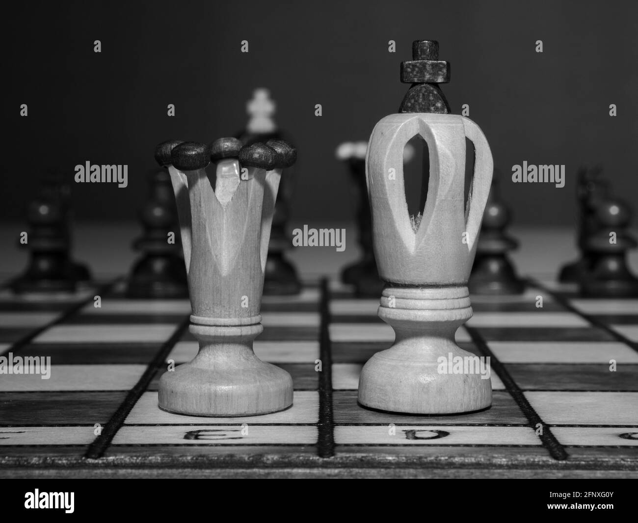 Black and white photo of king and queen chess pieces. Stock Photo