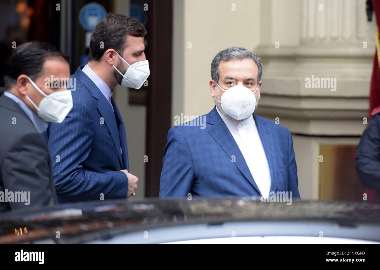 Vienna, Austria. 19th May, 2021. Iranian Deputy Foreign Minister Abbas Araqchi (R) leaves the venue of a meeting of the Joint Commission on the Joint Comprehensive Plan of Action (JCPOA) in Vienna, Austria, on May 19, 2021. Credit: Guo Chen/Xinhua/Alamy Live News Stock Photo