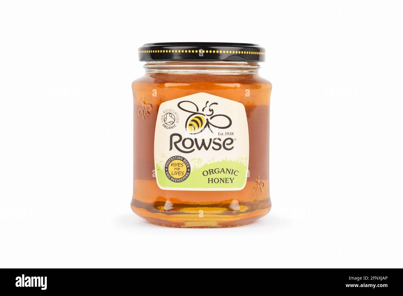 A jar of Rowse organic honey shot on a white background. Stock Photo