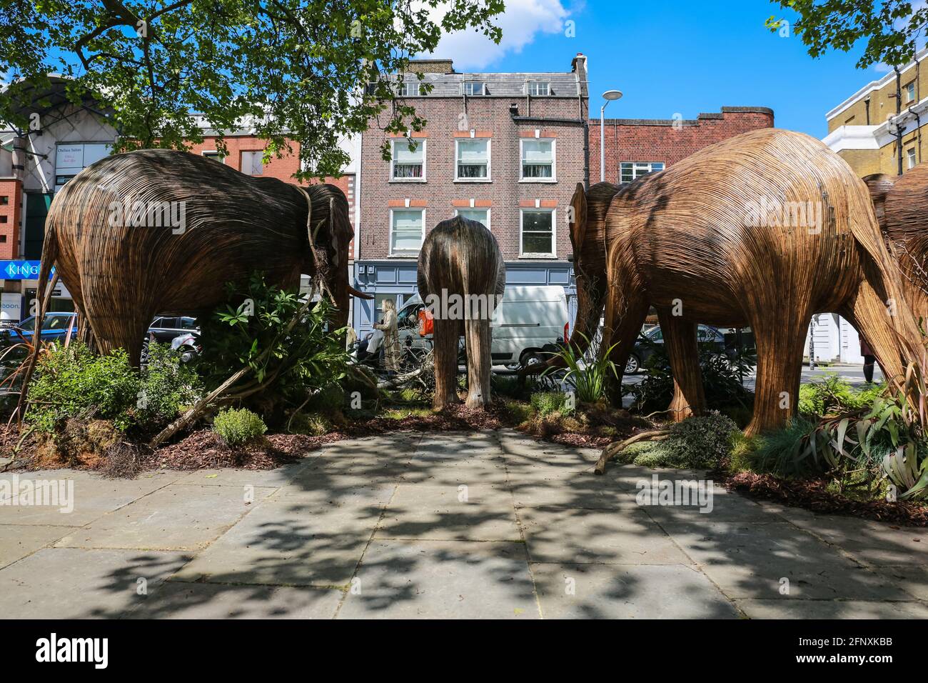 London, UK. 19 May 2021. Elephant sculptures on King's Road in Chelsea