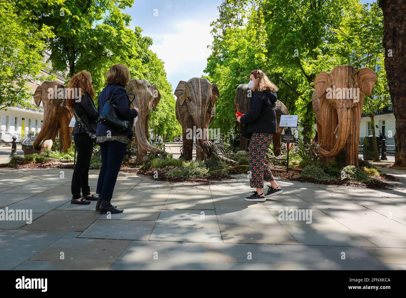 London, UK. 19 May 2021. Elephant sculptures on King's Road in Chelsea