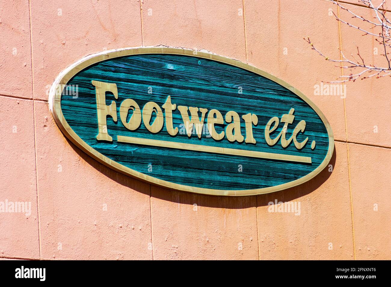 Footwear etc. sign, logo on the facade of a chain retail store Palo