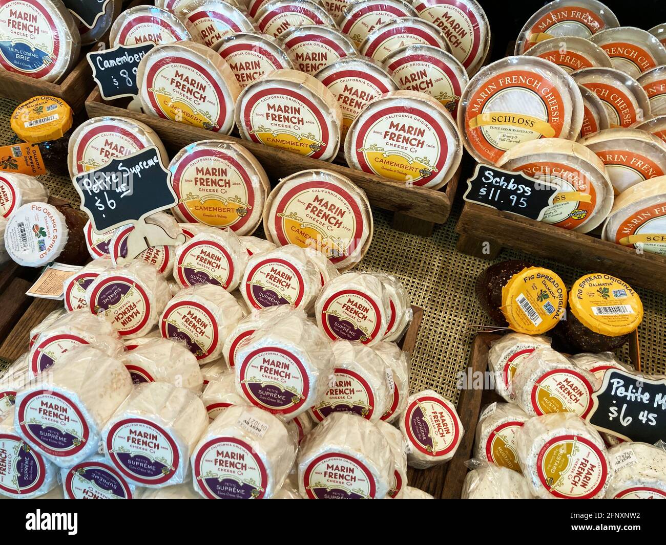 Marin French Cheese Company branded cheeses on the display shelf in the