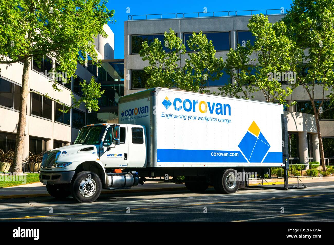 Corovan logo, sign on truck at commercial office building. Corovan is a full-service full-service commercial moving company - San Jose, California, US Stock Photo