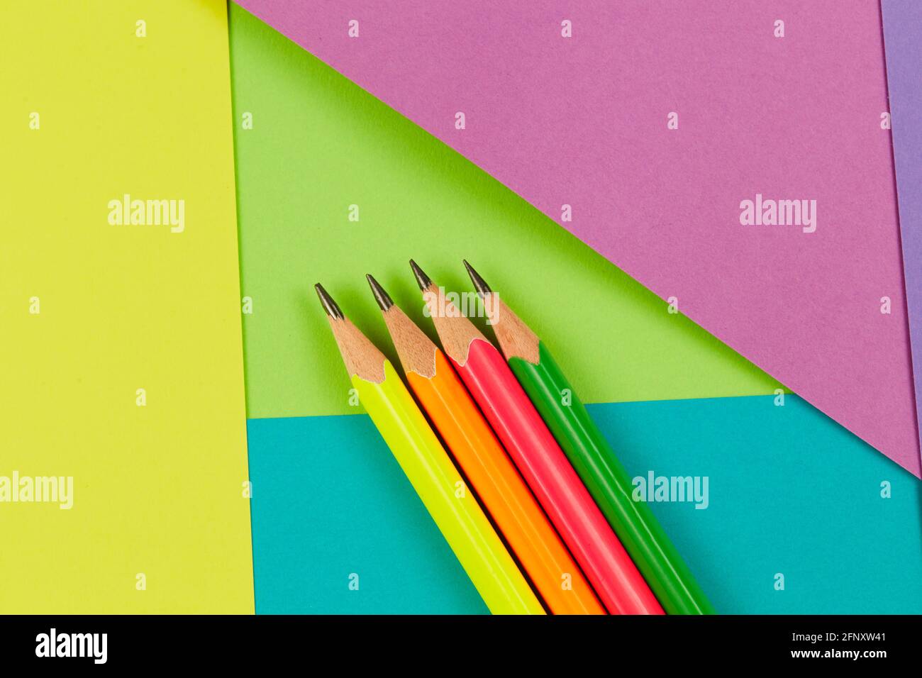 Pencils on a colorful background. Colorful school background concept. Stock Photo