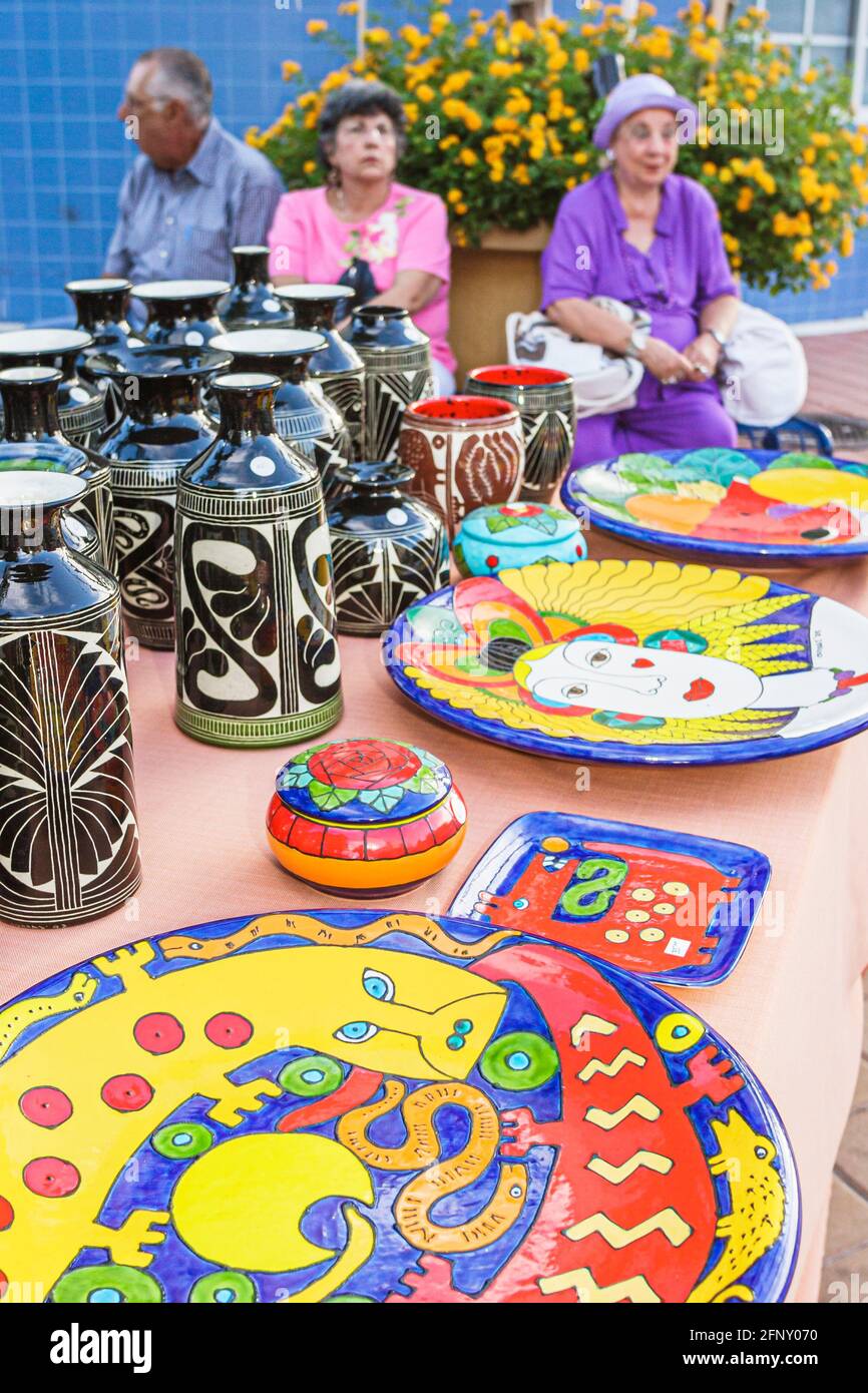 Miami Florida,Little Havana,Calle Ocho Art Walk,monthly event ceramic plates vases,Hispanic neighborhood display sale, Stock Photo