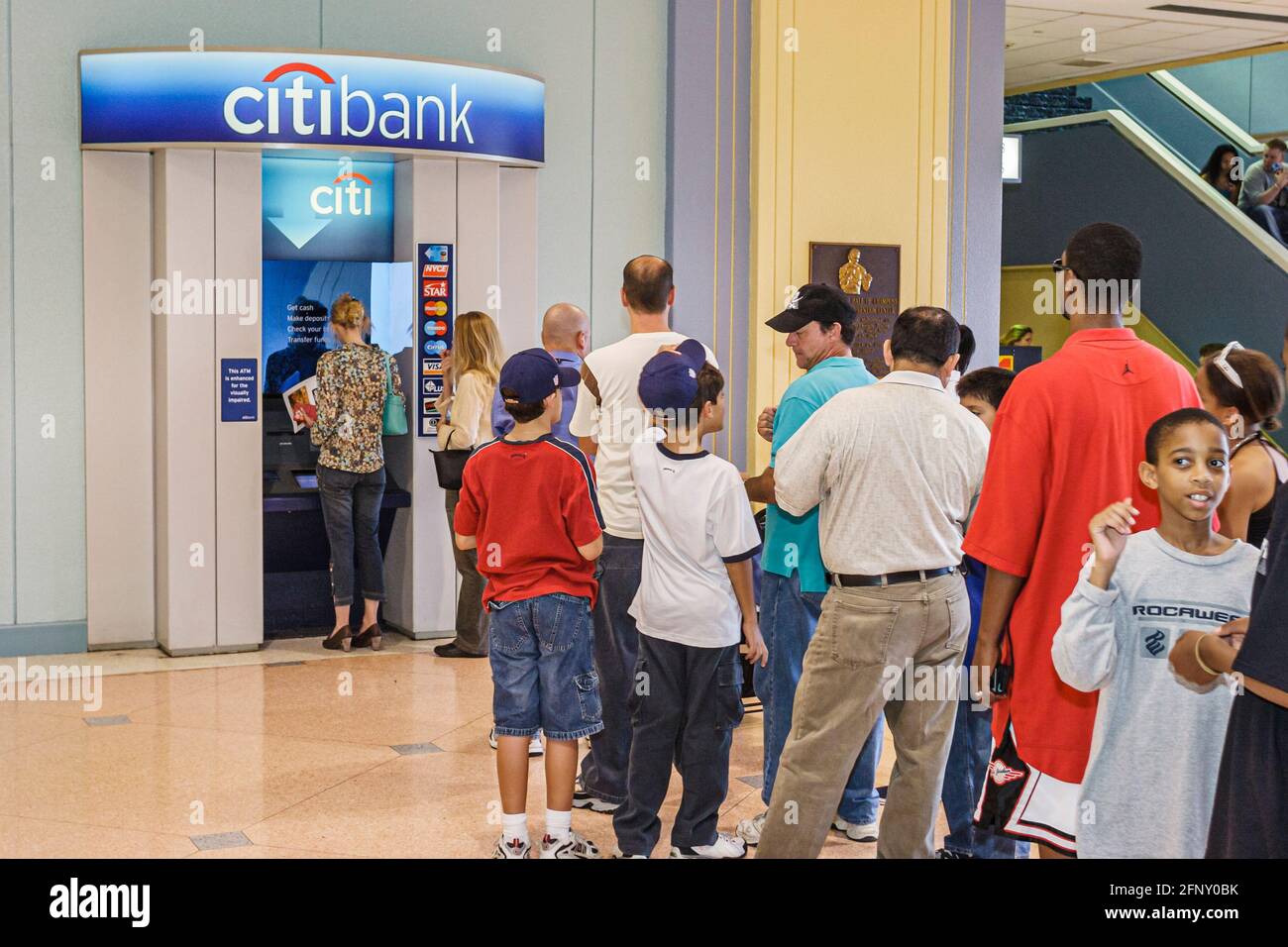 Florida,Miami Beach Convention Center,centre,Citibank ATM line queue customers waiting withdrawing money, Stock Photo
