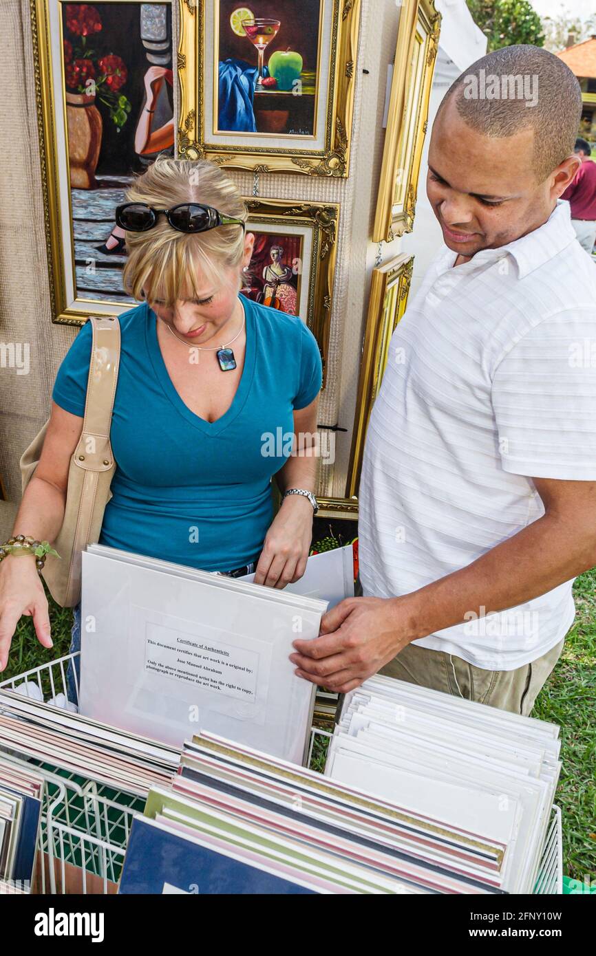 Miami Florida,Coconut Grove The Barnacle Historic State Park,Ralph Middleton Munroe Home Mad Hatter Arts Festival,woman female couple Black man male b Stock Photo