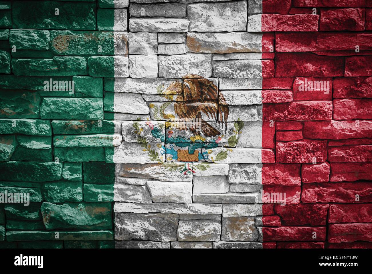 National flag of Mexico on stone wall background.The concept of ...