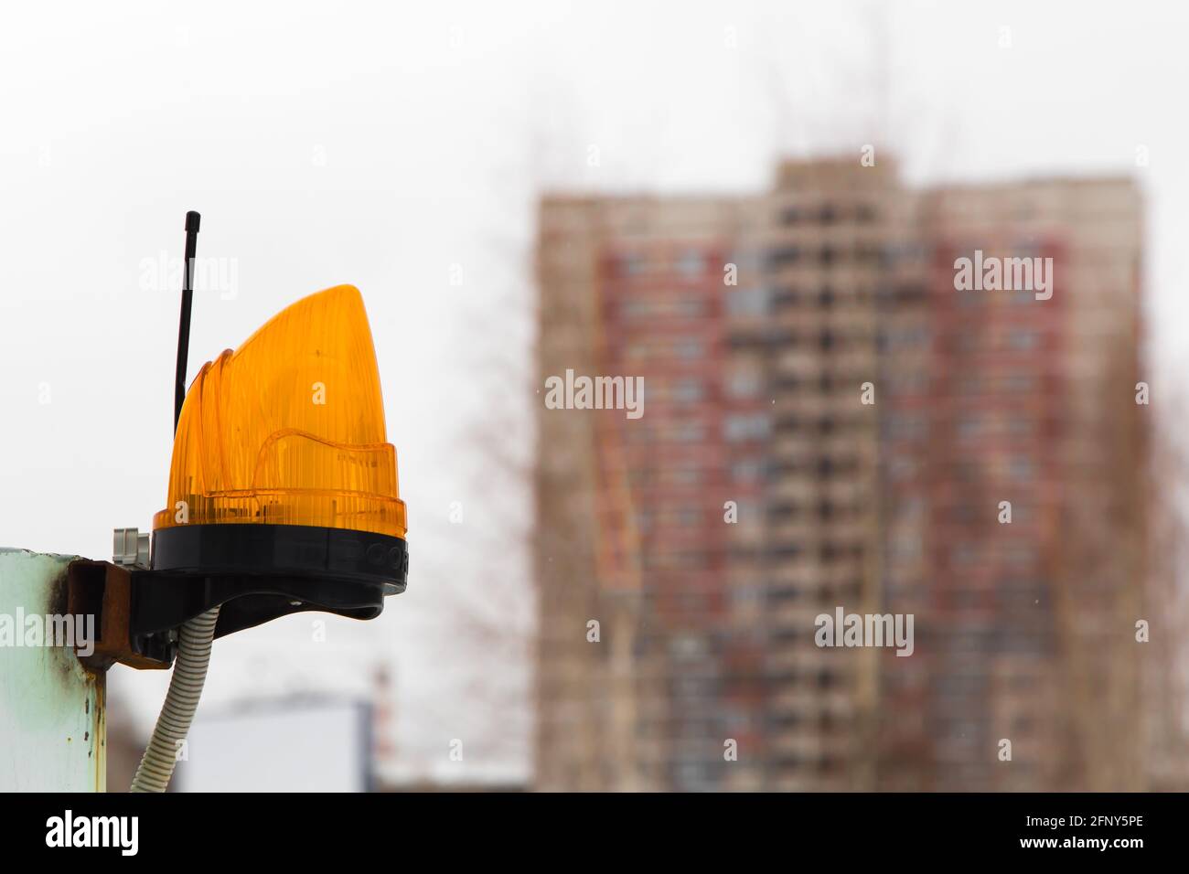 Alarm beacon with antenna for signal transmission. Signal lamp on a