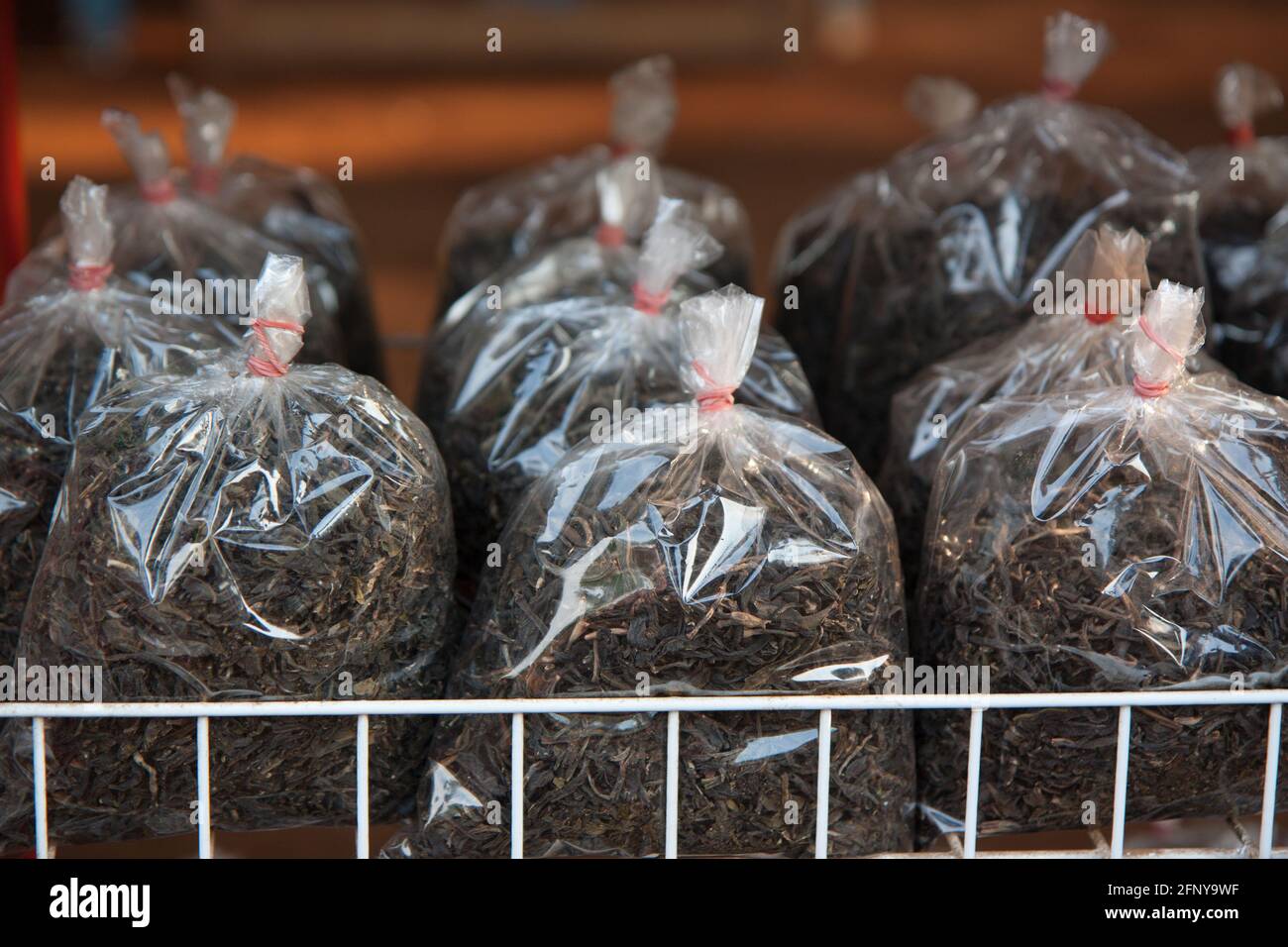 Bags of asian tea leaves at the local steet market in Laos Stock Photo