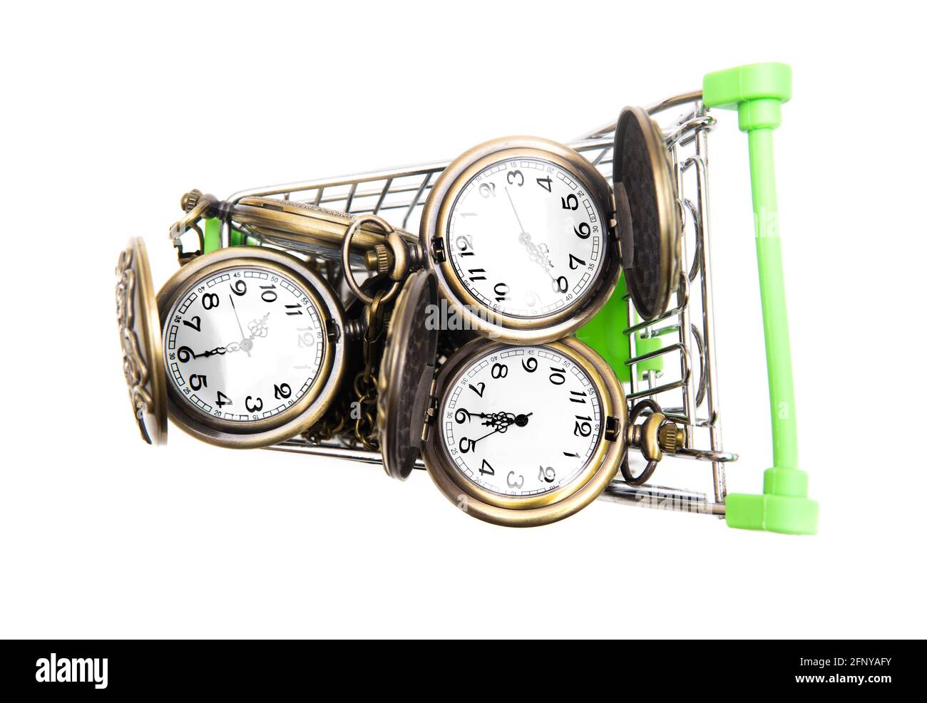 Miniature shopping cart full of antique pocket watches isolated on white background. Creative time buying concept. Stock Photo