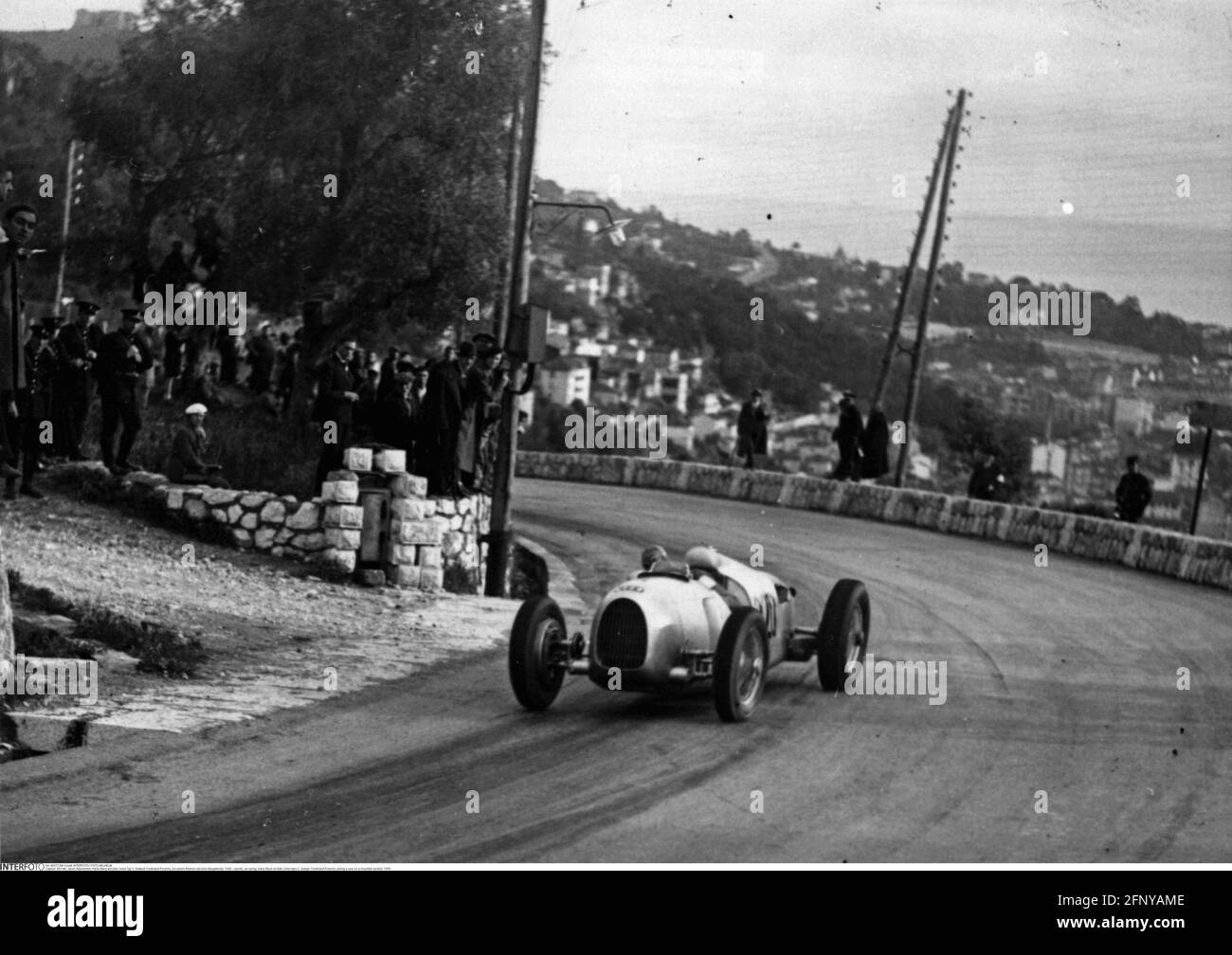 sports, car racing, Hans Stuck on Auto Union type C, design: Ferdinand Porsche, during a race on a mountain section, 1936, EDITORIAL-USE-ONLY Stock Photo
