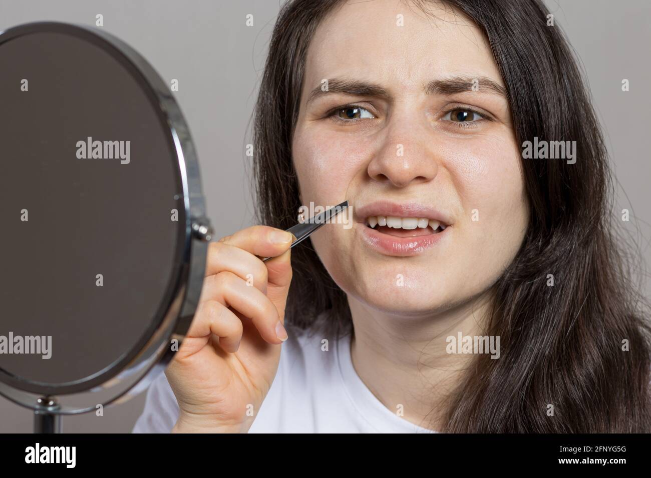 Woman hair upper lip hires stock photography and images Alamy
