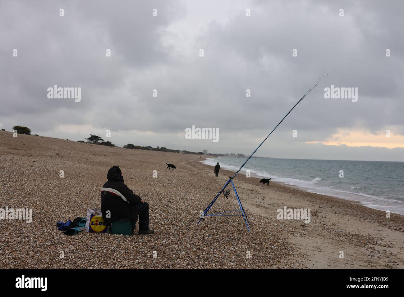 Fishing On The Beach, UK Stock Photo - Alamy