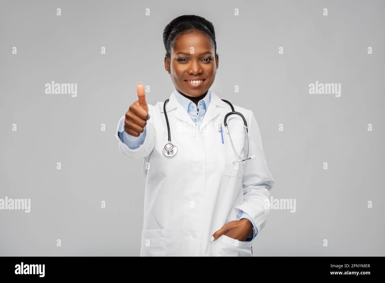 african american female doctor showing thumbs up Stock Photo - Alamy