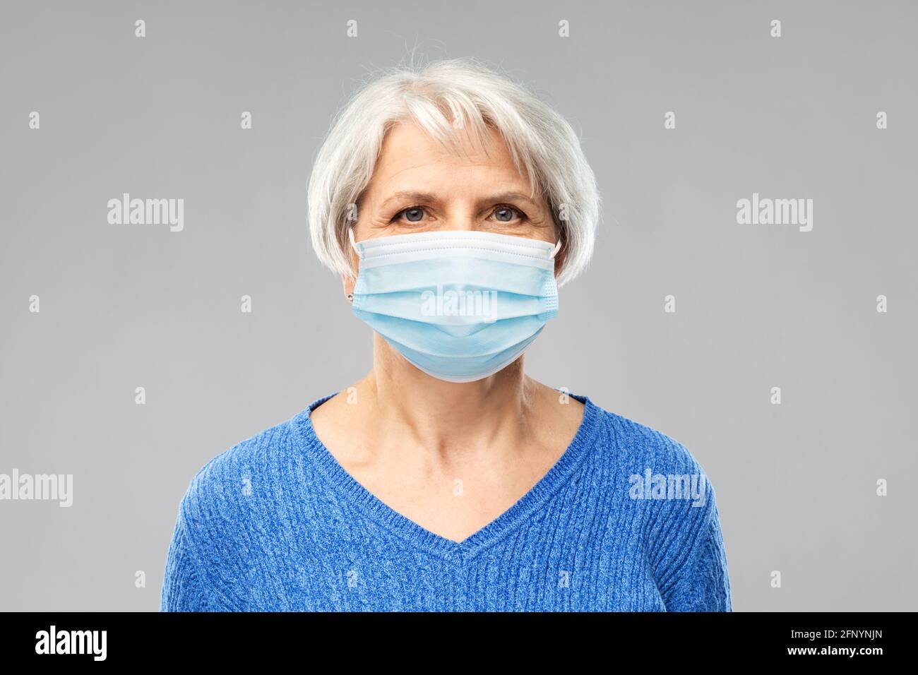 Adult senior woman in protective hi-res stock photography and images ...
