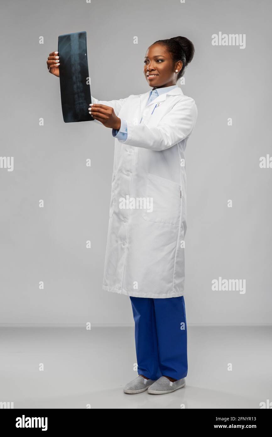 african american female doctor looking at x-ray Stock Photo - Alamy