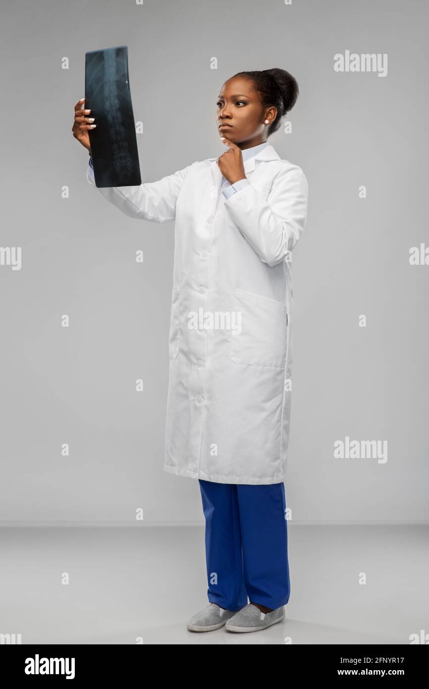 african american female doctor looking at x-ray Stock Photo - Alamy