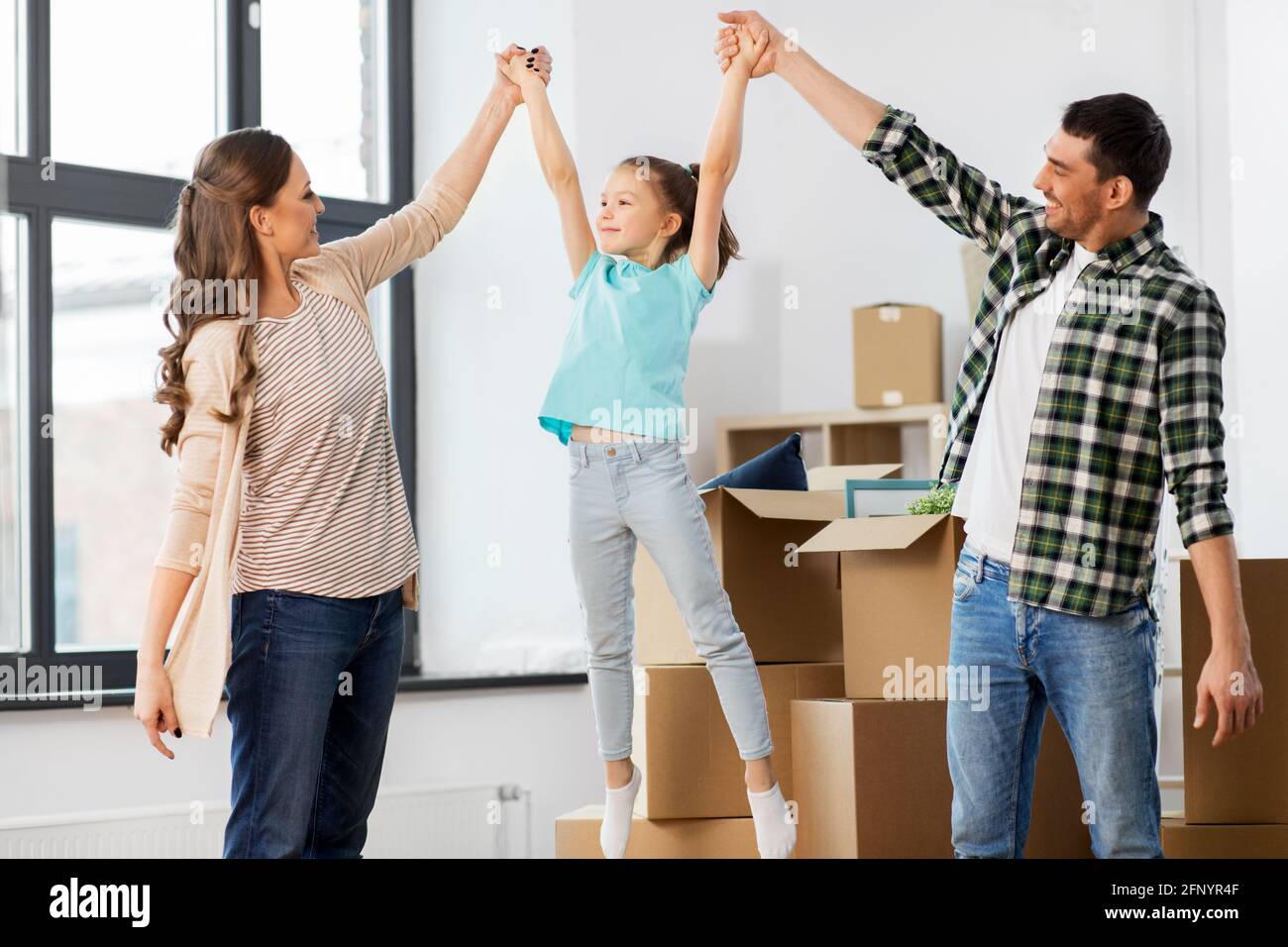 happy family with child moving to new home Stock Photo - Alamy