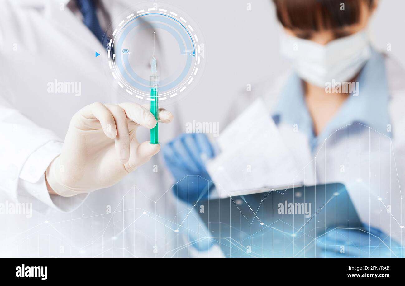 close up of doctor's hand with syringe Stock Photo - Alamy