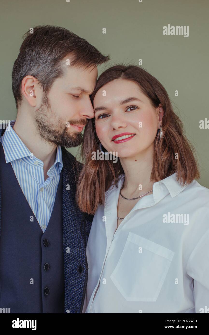 Portrait of a beautiful couple standing next to each other Stock Photo