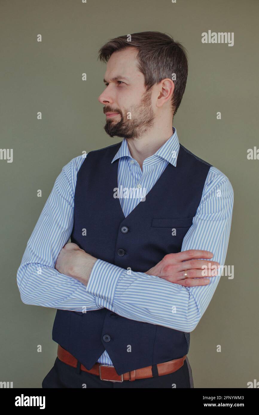 Portrait of a handsome man with a beard wearing a shirt and waistcoat Stock Photo