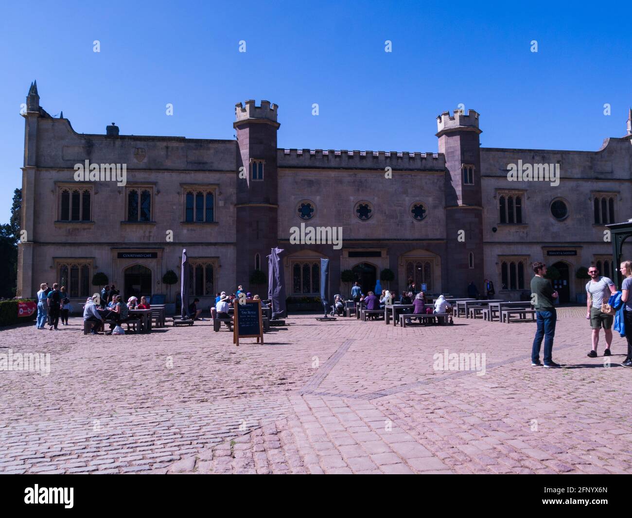 Visitors sitting outside of Courtyard Cafe Ashton Court Manor House