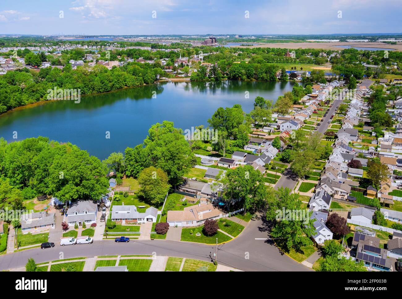 Aerial panorama view of the residential Sayreville town area of beautiful suburb of dwelling home near lake from a height in New Jersey US Stock Photo