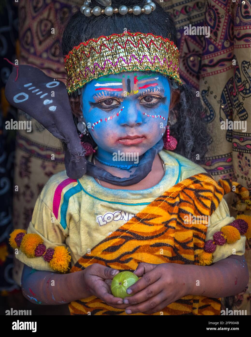 Little boy dressed as indian god hi-res stock photography and ...